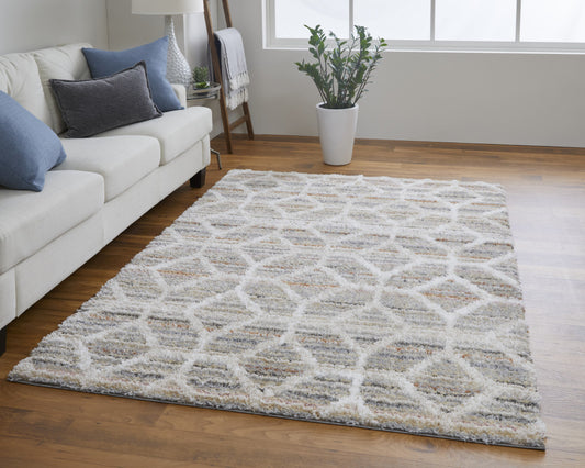 5' X 8' Tan Taupe And Ivory Geometric Power Loom Stain Resistant Area Rug