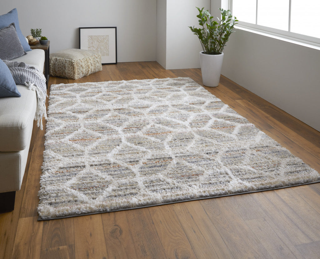 5' X 8' Tan Taupe And Ivory Geometric Power Loom Stain Resistant Area Rug