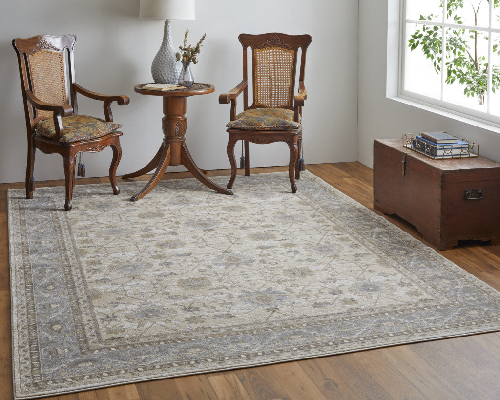 5' X 8' Tan Ivory And Gray Power Loom Area Rug