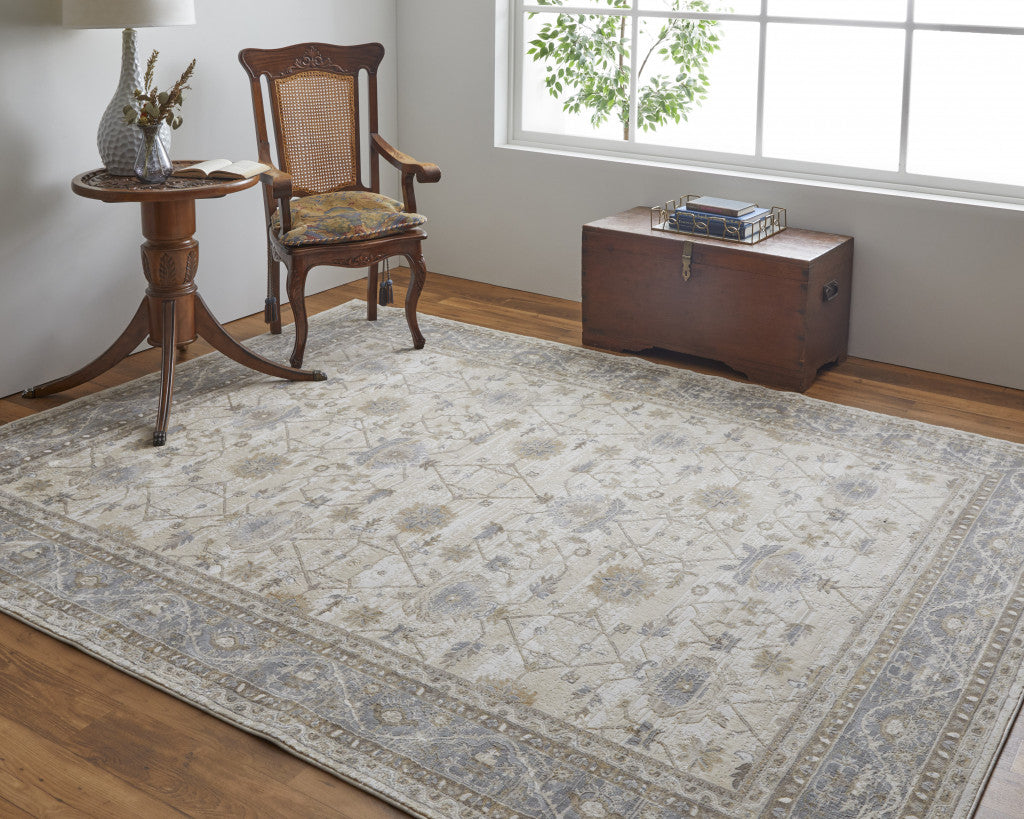 5' X 8' Tan Ivory And Gray Power Loom Area Rug