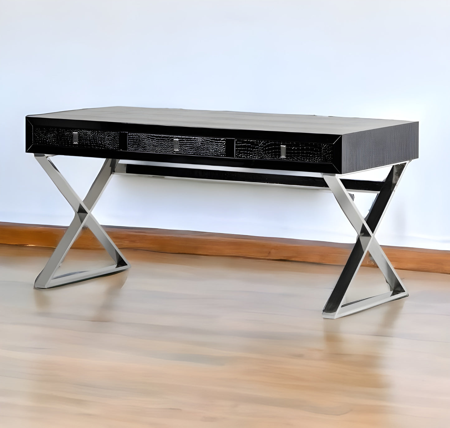 57" Black And Silver Wood And Stainless Steel Coffee Table With Three Drawers