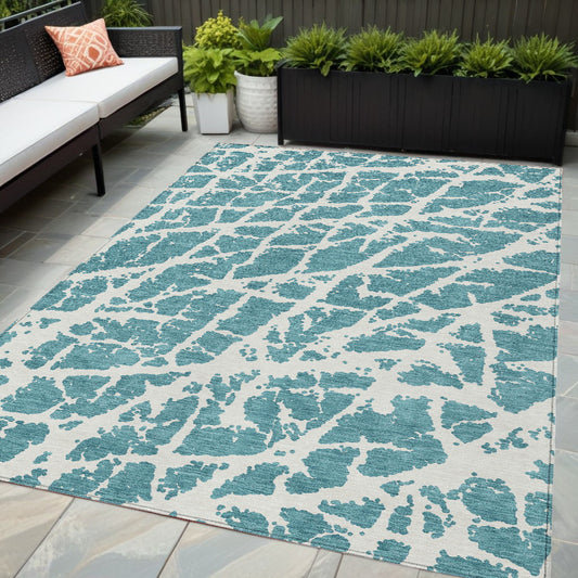 5' X 8' Teal Abstract Washable Non Skid Indoor Outdoor Area Rug