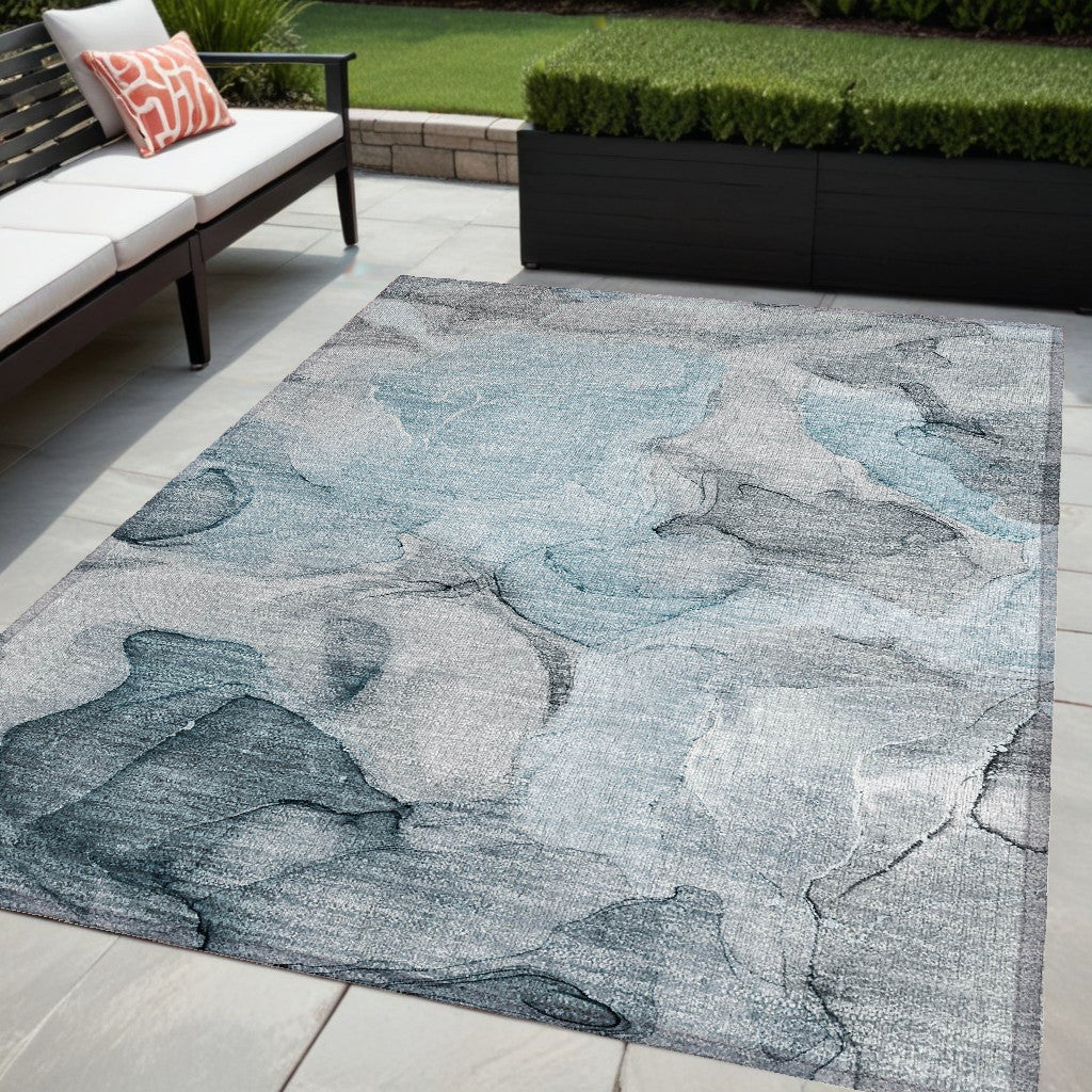 5' X 8' Teal Abstract Washable Non Skid Indoor Outdoor Area Rug