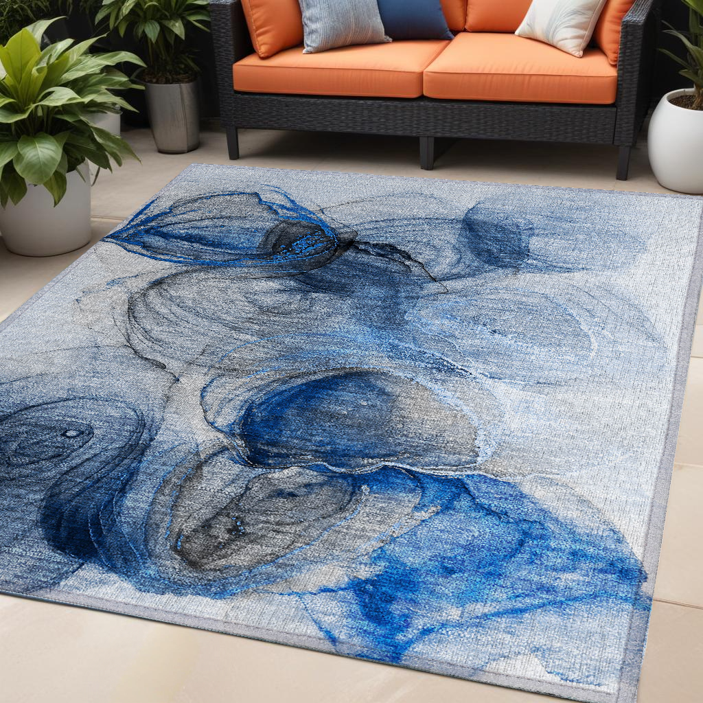 5' X 8' Ivory Blue and Gray Abstract Washable Non Skid Indoor Outdoor Area Rug