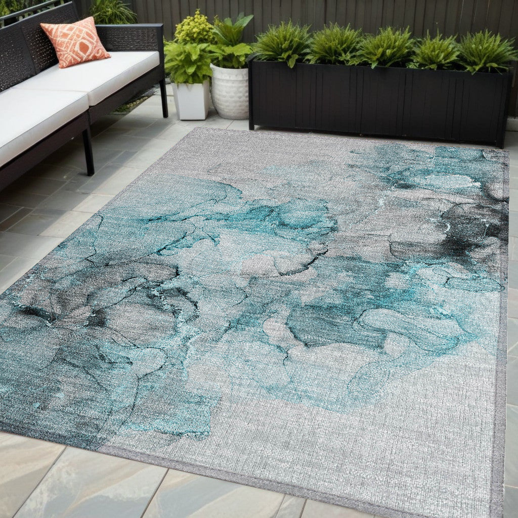 5' X 8' Teal Abstract Washable Non Skid Indoor Outdoor Area Rug