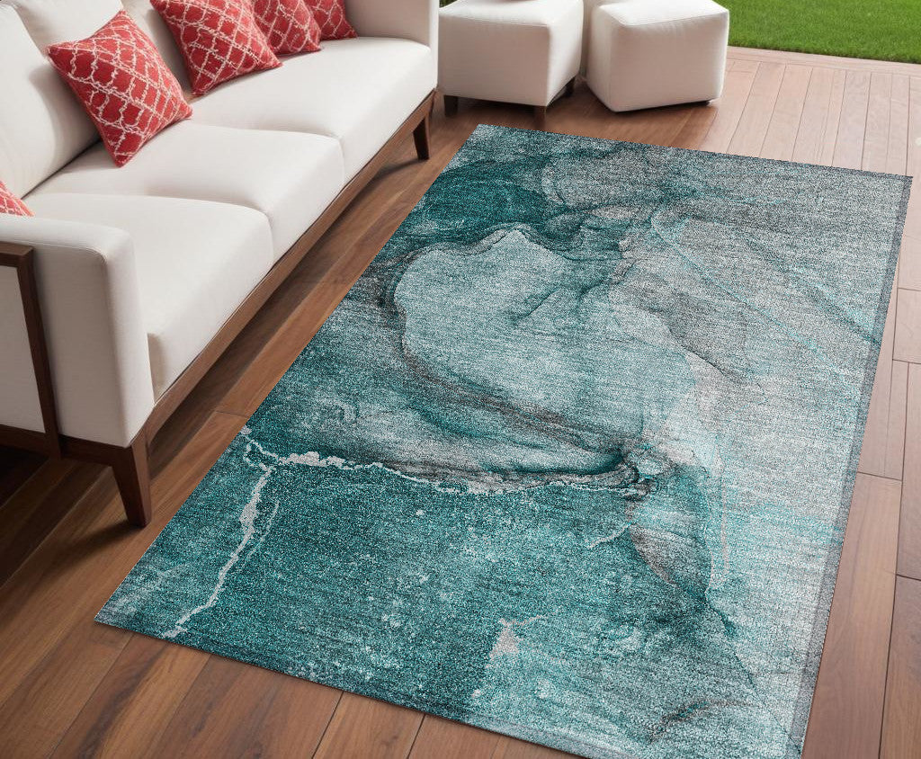 5' X 8' Teal Abstract Washable Non Skid Indoor Outdoor Area Rug