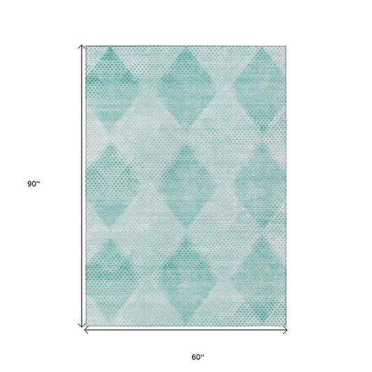 5' X 8' Teal Geometric Washable Non Skid Indoor Outdoor Area Rug