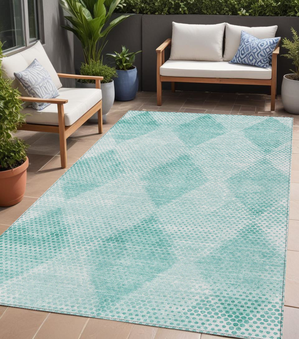 5' X 8' Teal Geometric Washable Non Skid Indoor Outdoor Area Rug