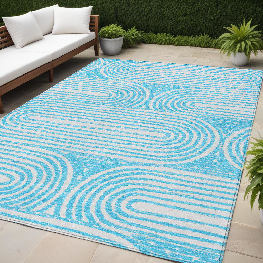 5' X 8' Teal Abstract Washable Non Skid Indoor Outdoor Area Rug