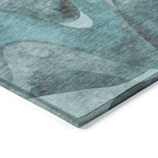 5' X 8' Teal Abstract Washable Non Skid Indoor Outdoor Area Rug