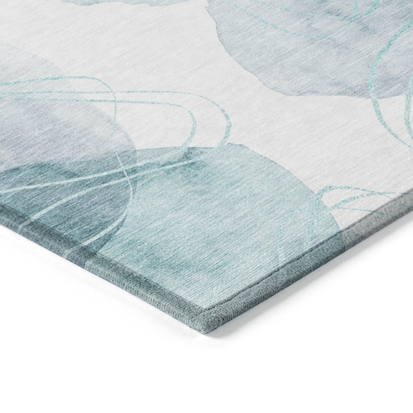 5' X 8' Teal and Ivory Abstract Washable Non Skid Indoor Outdoor Area Rug