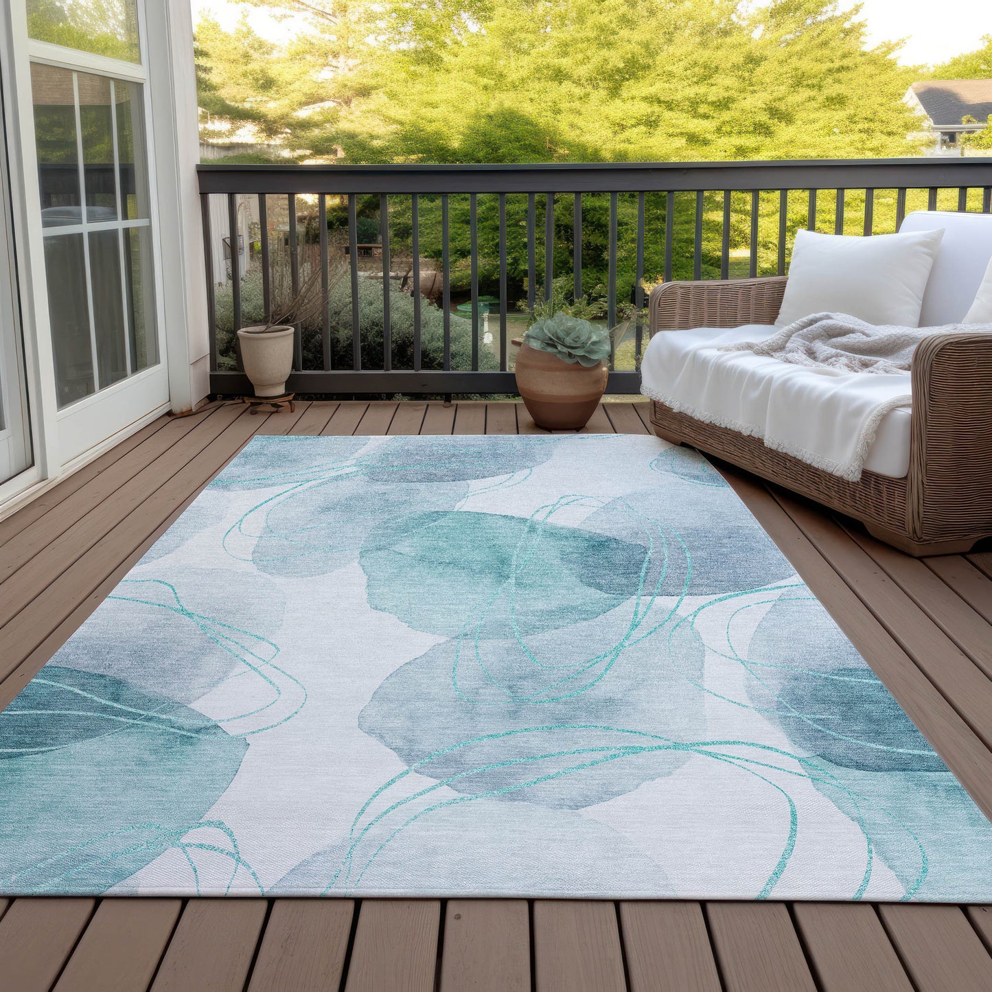 5' X 8' Teal and Ivory Abstract Washable Non Skid Indoor Outdoor Area Rug