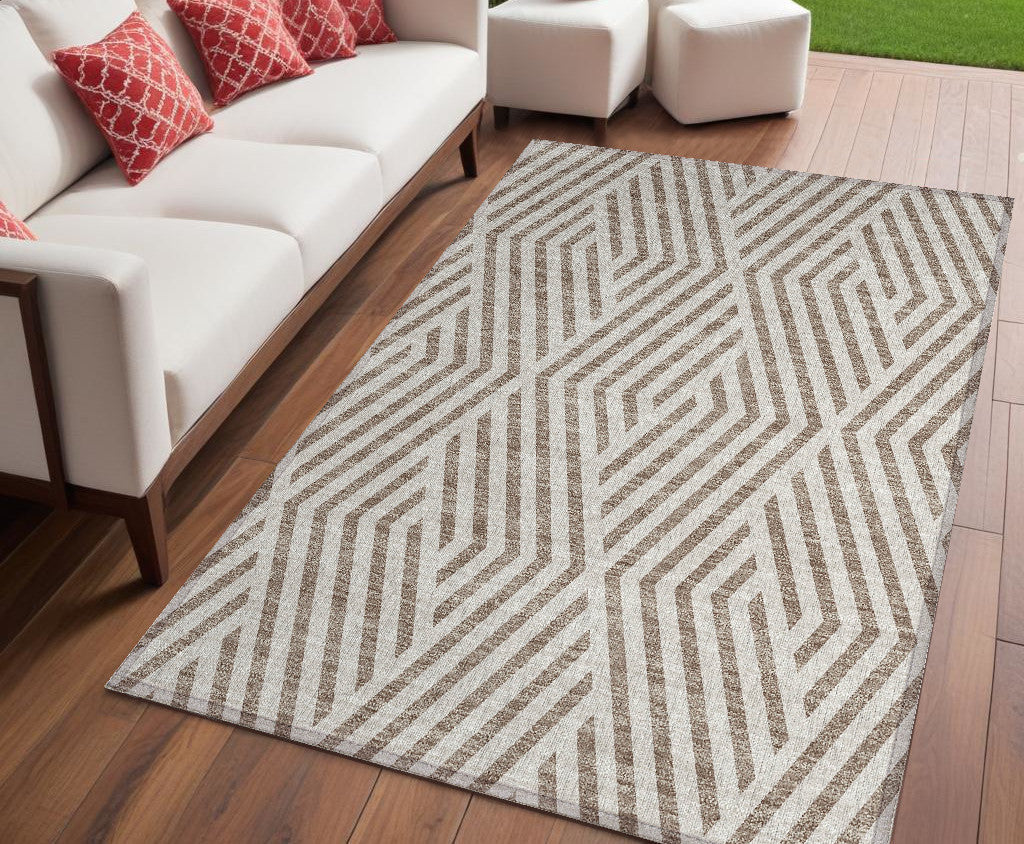 5' X 8' Taupe and Ivory Geometric Washable Non Skid Indoor Outdoor Area Rug