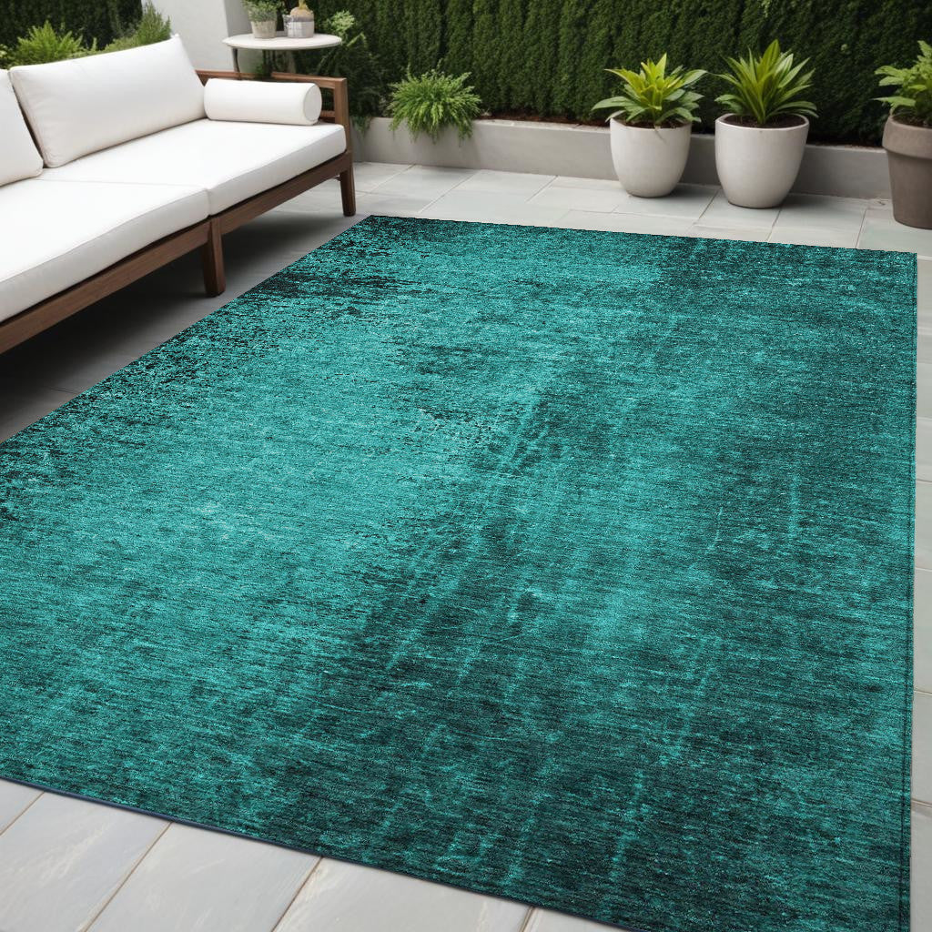 5' X 8' Teal Abstract Washable Non Skid Indoor Outdoor Area Rug