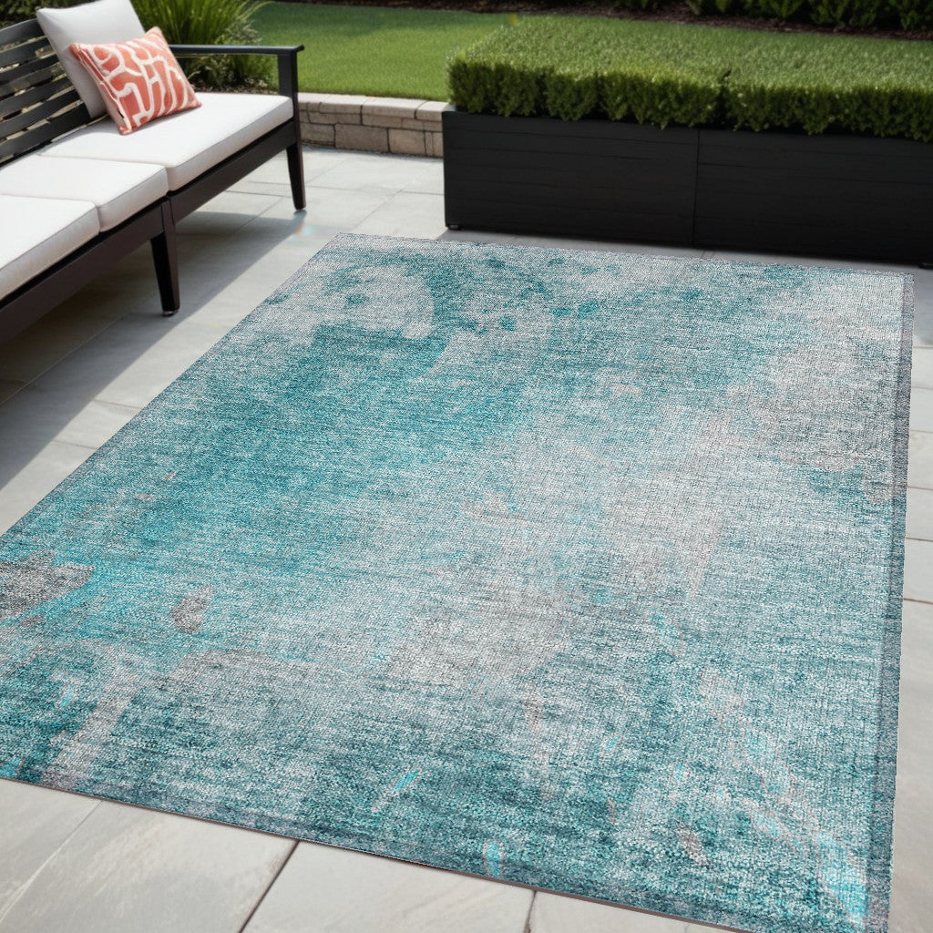 5' X 8' Teal Abstract Washable Non Skid Indoor Outdoor Area Rug