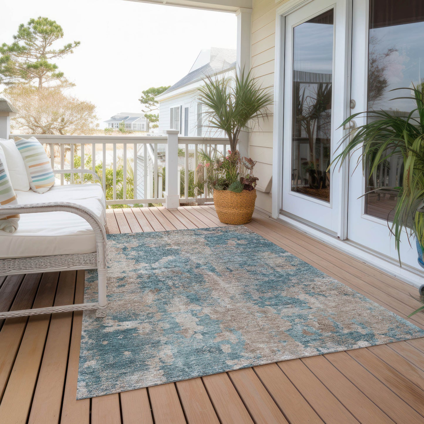 5' X 8' Teal and Taupe Abstract Washable Non Skid Indoor Outdoor Area Rug