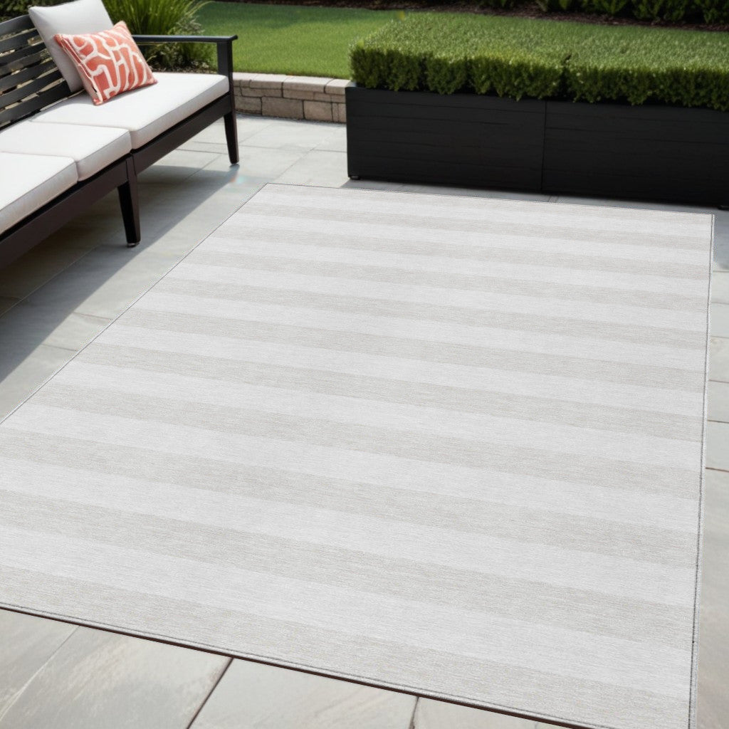 5' X 8' Ivory Striped Washable Indoor Outdoor Area Rug